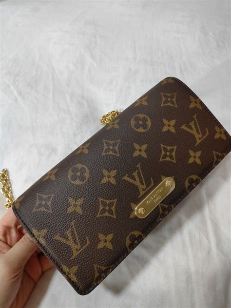 louis vuitton lily woc|louis vuitton chain lily wallet.